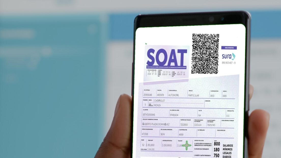 Close-up of african woman holding mock up green screen chroma key phone with isolated display