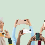 Social media audience crowd filming through smartphones